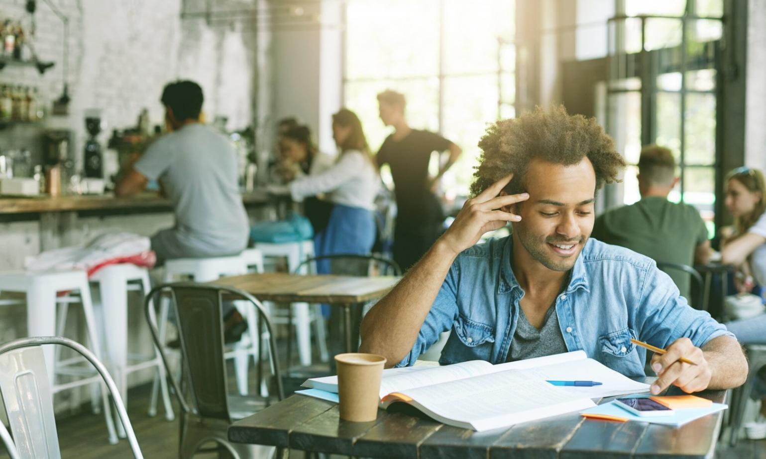 Practical budgeting workshop session with participants reviewing real expense categories